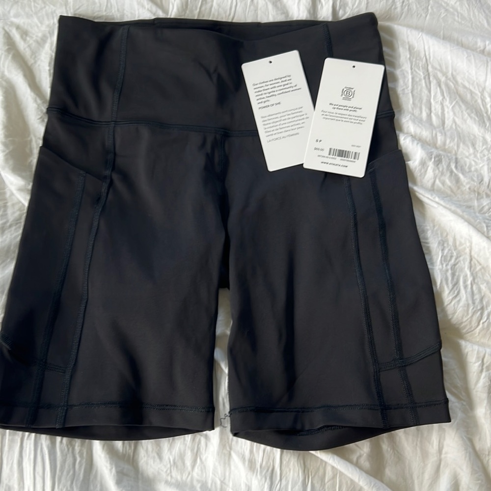 New tags removed biker shorts size small. Black with pockets